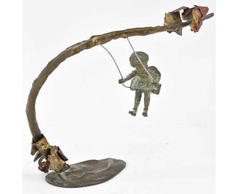 A modern abstract bronze sculpture, 'Girl on a Swing', height 22cm.