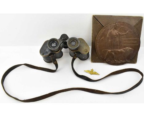 Three military items comprising a bronze memorial plaque for Harold Bailey, a pair of German Goerz binoculars and a small bra
