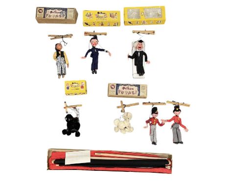 PELHAM PUPPETS; six boxed puppets comprising Policeman, Schoolmaster/Teacher, Dutch Boy, two soldiers/Frizi and a black and a