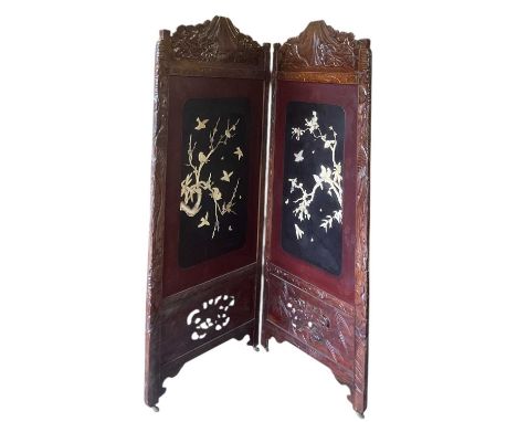 A modern Chinese carved hardwood two-section room dividing screen, set with white painted carved wooden decoration of birds a
