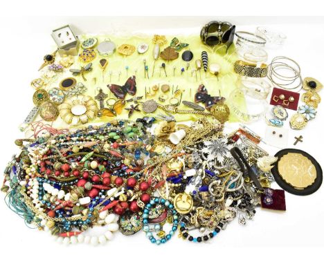 A quantity of modern, vintage and antique costume jewellery including rings, earrings, heart shaped lockets, brooches, butter