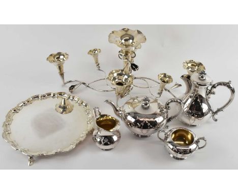 A quantity of silver plated items including seven branch epergne, four piece silver plated tea service comprising teapot, hot
