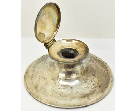 An early 20th century hallmarked silver capstan inkwell, with glass inner well, indistinct hallmarks, diameter 15.5cm, height