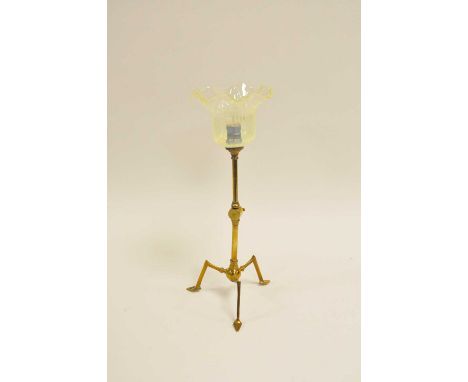 A W.A.S Benson style brass table/wall lamp, on adjusting angular tripod foot, with a flared ribbed Vaseline glass shade, 42cm