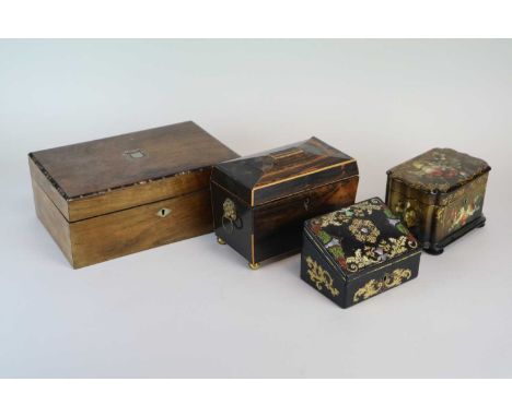 A small 19th century coromandel veneered sarcophagus shaped tea caddy, with hinged cover and divisional interior, 14cm high, 