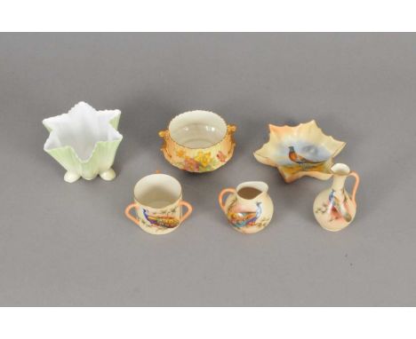 A small collection of blush ivory early 20th century comprising a Locke &amp; Co three-handled loving cup, jug, slender necke