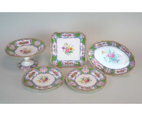 A Spode Copeland dessert service early 20th century with scale green borders, printed and painted with panels of flowers and 