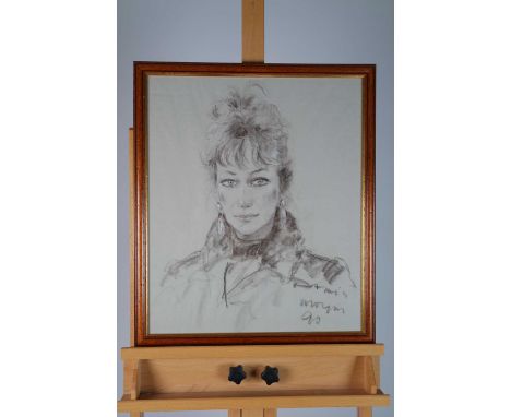 British School (20th Century), Charcoal Portrait of a Lady, charcoal on paper, signed borrom right and dated '90, framed. Mea
