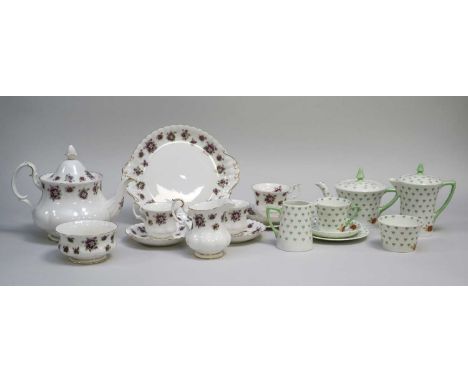 A Royal Albert 'Sweet Violet' tea service, comprising teapot and cover, six coffee cups, six saucers, nine teacups, sugar bow