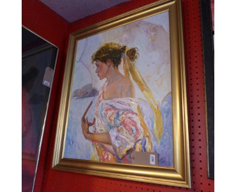A framed oil on canvas portrait of a girl indistinctly signed 85 x 72cm 