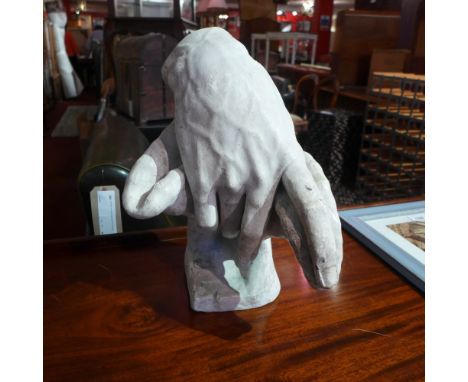 A plaster model of a classical sculpture of a hand, cast from a piece at the British Museum