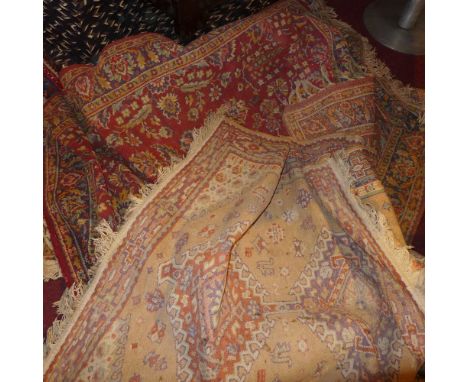A collection of flour vintage rugs 