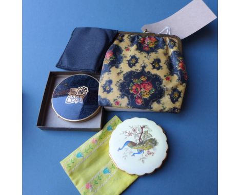 A collection of four vintage compacts by Stratton, some boxed 