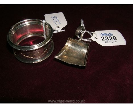 A Georgian Silver caddy Spoon, Birmingham 1804 and a Silver Napkin Ring