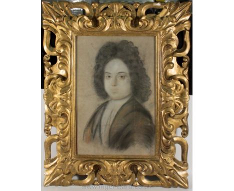 Attributed to Edmund Ashfield fl. 1660-90, a crayon portrait of a young nobleman. In a 17th century Florentine carved wood fr