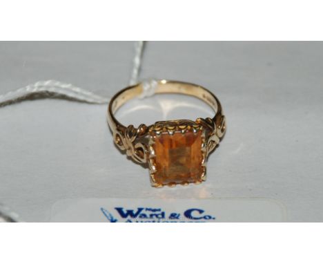 A 9ct Gold Ring with emerald cut Citrine.