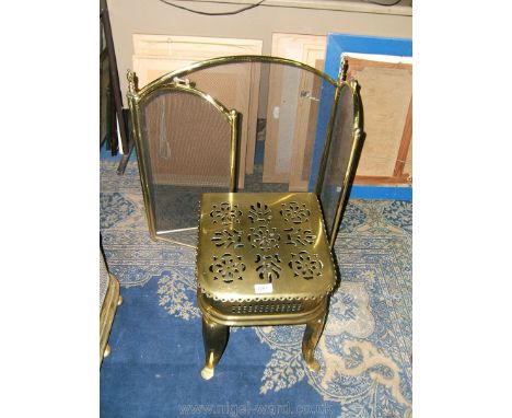 A Brass Fireside Trivet and a folding Fireguard