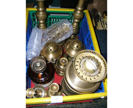 A quantity of brass including two pairs of candlesticks, tea-light holders, planter, anchor and three oil lamp burners