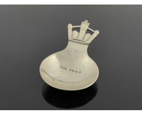 R. E. Stone, an Art Deco silver caddy spoon, London 1935, circular planished bowl with open geometric coronet finial, 7.5cm l