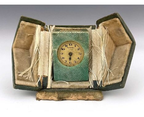 Tonnel, an Art Deco miniature travel time piece, shagreen covered gilt brass, applied gold monogram, in fitted leather case, 