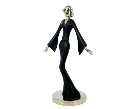 An Austrian Art Deco nickel and wood figure, circa 1930, modelled as a woman in evening dress, in the style of Hagenauer, car