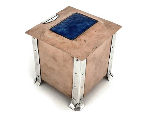 A E Jones an Arts and Crafts silver mounted enamelled copper tea caddy, cuboid form, with riveted strap legs, the hinged lid 