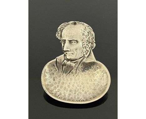 Bernard Instone, an Arts and Crafts Wordsworth silver caddy spoon, Birmingham 1929, cast with a bust of the poet, 7cm long, 0