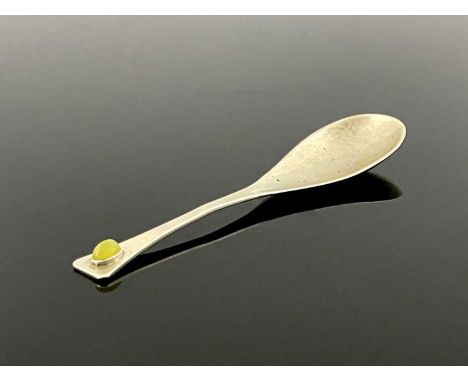 C R Ashbee for Guild of Handicraft, an Arts and Crafts silver and gem set spoon, London 1901, the elongated pear shaped bowl 
