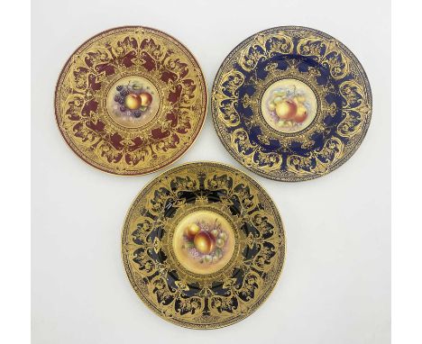 J Reed et al for Royal Worcester, three painted cabinet plates, circa 1970, each decorated with a circular panel of fruit and