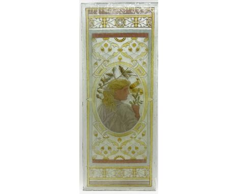 A pair of Aesthetic Movement stained glass door or window inserts, circa 1880, each with an oval portrait of aubern-haired ma