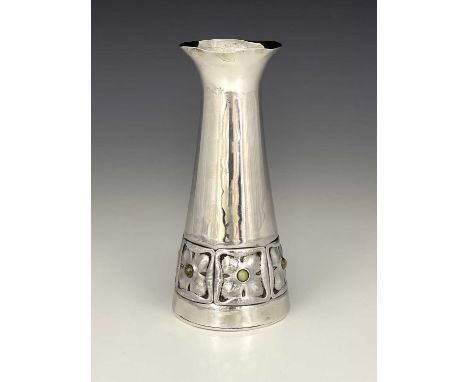 Oliver Baker for Liberty and Co., an Arts and Crafts Cymric silver and gem set vase, Birmingham 1902, conical form embossed w