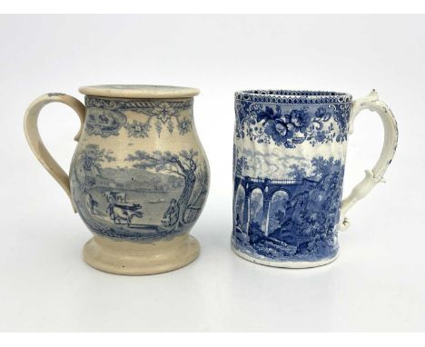 A 19th Century blue transfer printed tankard, wrythen moulded with a 'C' scroll handle with acanthus terminal, 'Cambrian Brid