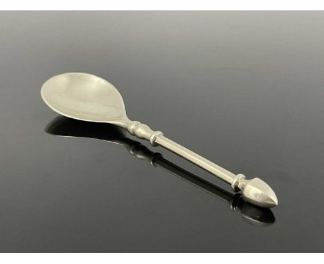 Guild of Handicraft, an Arts and Crafts silver spoon, London 1931, the pear shaped bowl on a knopped baluster and hexagonal s