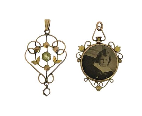 A 9ct gold peridot set openwork pendant, with foliate and open scroll decoration, together with an circular portrait pendants