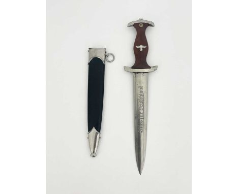 Third Reich German NSKK dagger, housed in black painted steel scabbard with white metal mounts, white metal hilt and wood gri