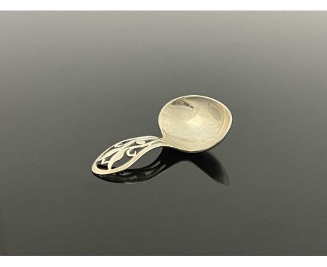 Bernard Instone, an Arts and Crafts silver caddy spoon, Langstone Silver Works, Birmingham 1920, fret pierced tulip motif to 
