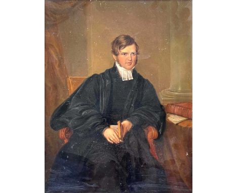 James Leakey (British, 1775-1865), portrait of a young cleric, three quarter length seated in an interior, indistinctly inscr
