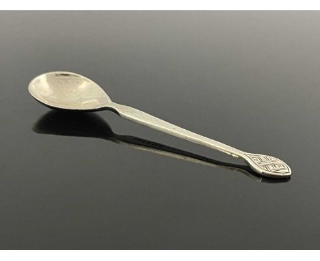 Bernad Cuzner for Liberty and Co., an Arts and Crafts silver teaspoon, Birmingham 1913, the pear shaped bowl on a planished h