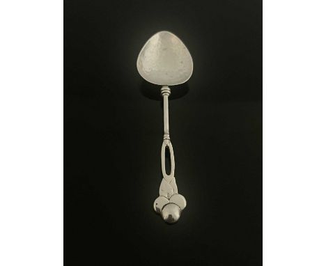 Winifred King, an Arts and Crafts silver spoon, Birmingham 1925, planished pointed bowl on a bisected stem terminating in sty