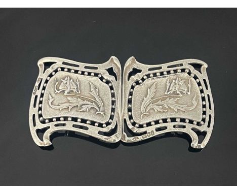 An Arts and Crafts silver buckle, William Comyns, London 1901, each scroll cartouche panel cast with stylised poppies in reli