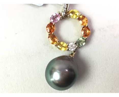 COLOURED SAPPHIRE AND TAHITIAN PEARL PENDANT, with certificate of authenticity, in nine carat gold, along with a donut jade p