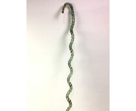 GREEN GLASS WALKING STICK, LATE 19TH/EARLY 20TH CENTURY of spiral twist form96cm long
