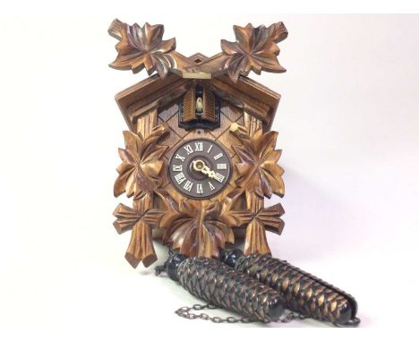 CUCKOO CLOCK, AND OTHER ITEMS  including two mantel clocks and a companion set