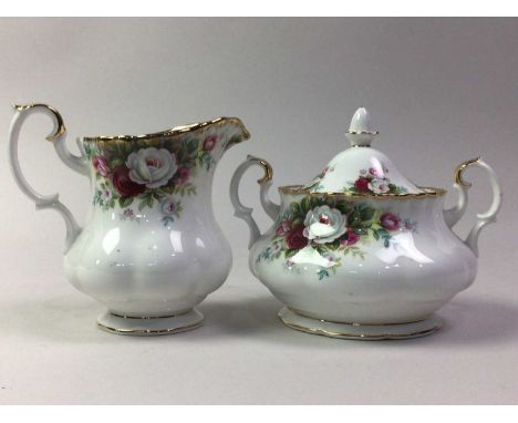 ROYAL ALBERT TEA SERVICE, CELEBRATION PATTERN comprising six cups and saucers, sugar and cream, six side plates and a tea pla