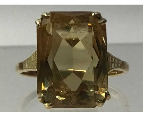 THREE NINE CARAT GOLD DRESS RINGS, comprising amethyst, citrine and ruby