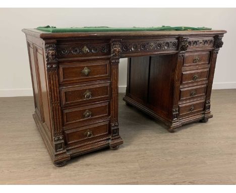 VICTORIAN OAK TWIN PEDESTAL DESK, with carved frieze drawers82cm x 145cm Table top inset in very poor condition. Lion masks m