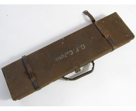 A late 19th / early 20th Century canvas gun case bearing the label of William Horton of Glasgow, containing sundry gun cleani