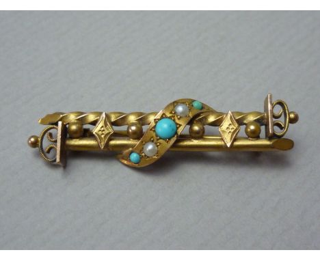 A Victorian Etruscan Revival turquoise and seed pearl bar brooch, having plain and cabled bars surmounted by a gypsy set ribb