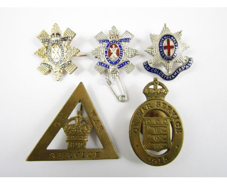 A Black Watch enamelled white metal sweetheart brooch (stamped Sterling), a similar base metal brooch, a Coldstream Guards ol
