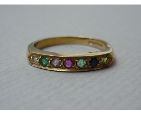 An acrostic 'Dearest' gemstone ring, the sunken face pellet set with circular-cut stones, arranged in the sequence diamond, e